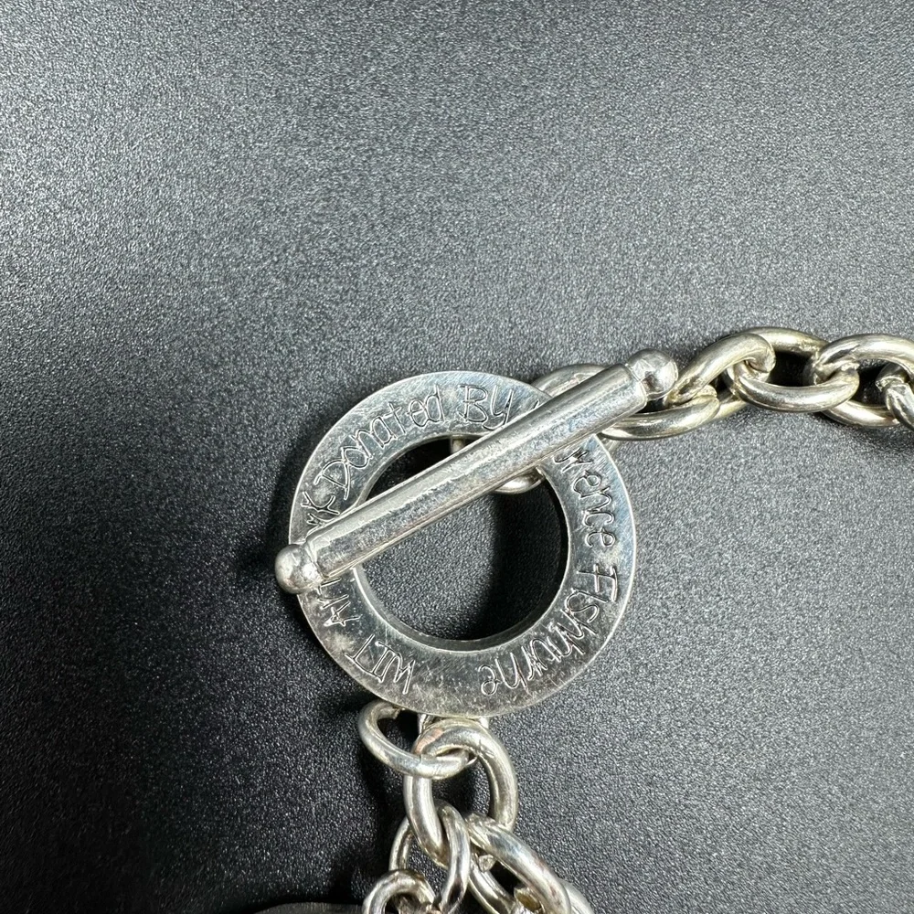 WIT Artwork Donated by Laurence Fishburn Sun Charm Bracelet Toggle Closu…